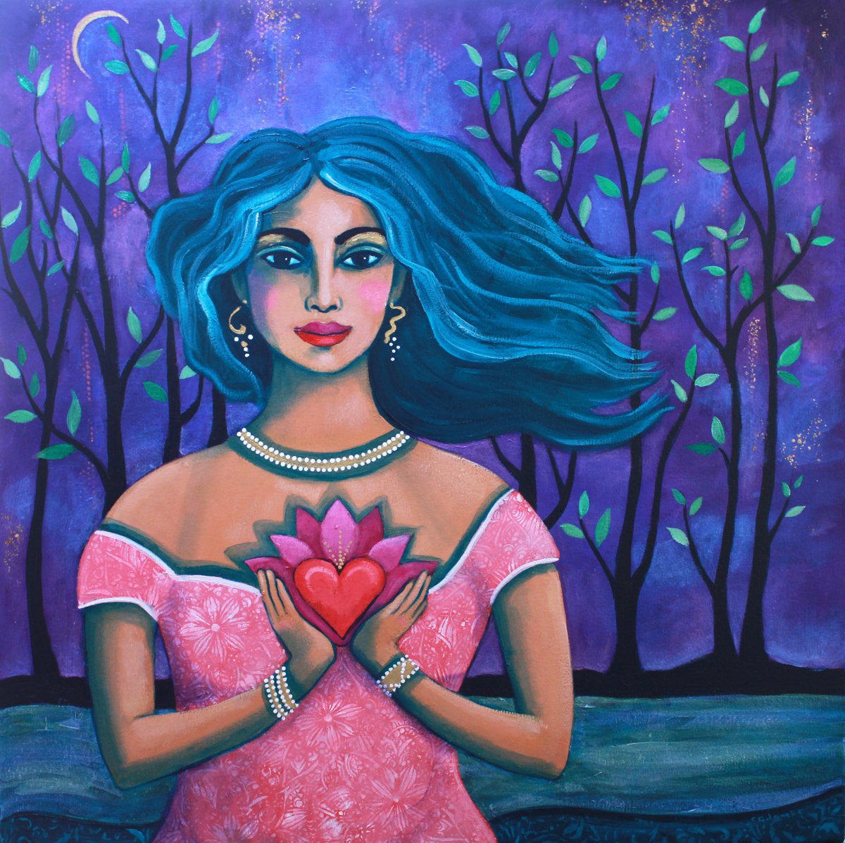 a woman stands in front of trees adn a river holding a lotus flower and a heart
