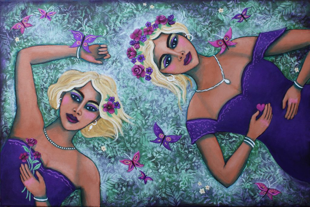 Two blonde women lie in a field. They are wearing deep purple dresses and are surrounded by butterflies. They have flowers in their hair